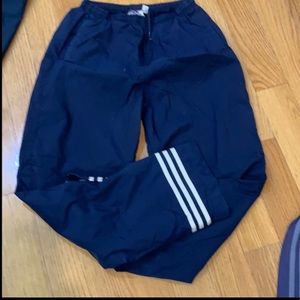 Adidas track pants.